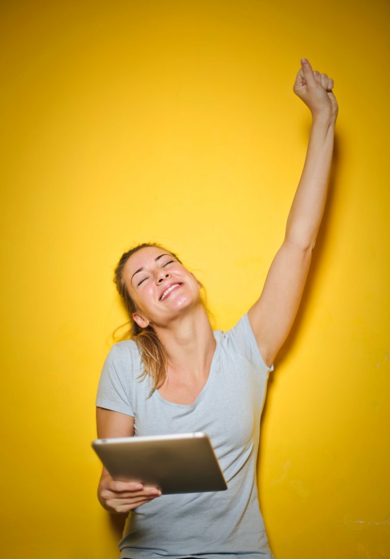 A young blonde woman enjoying success